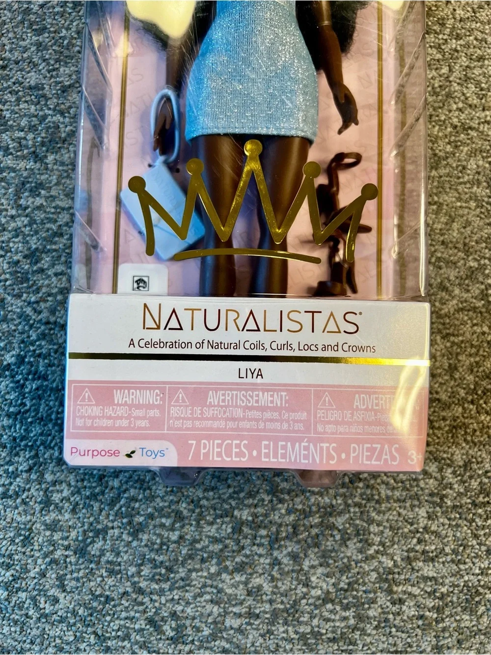 El Naturalista Kids Doll in Light Blue Dress with Dark Brown Skin and Black Hair